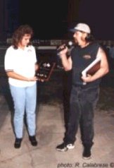 Rick Anges presenting an award to Kim Sheffler-Hays